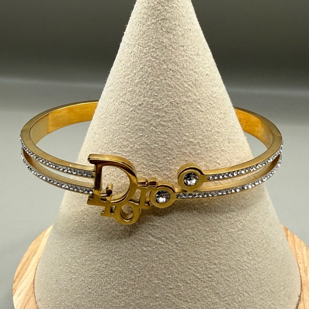 Gold tone Di OR logo stainless steel crystal sparkling bangle bracelet NEW